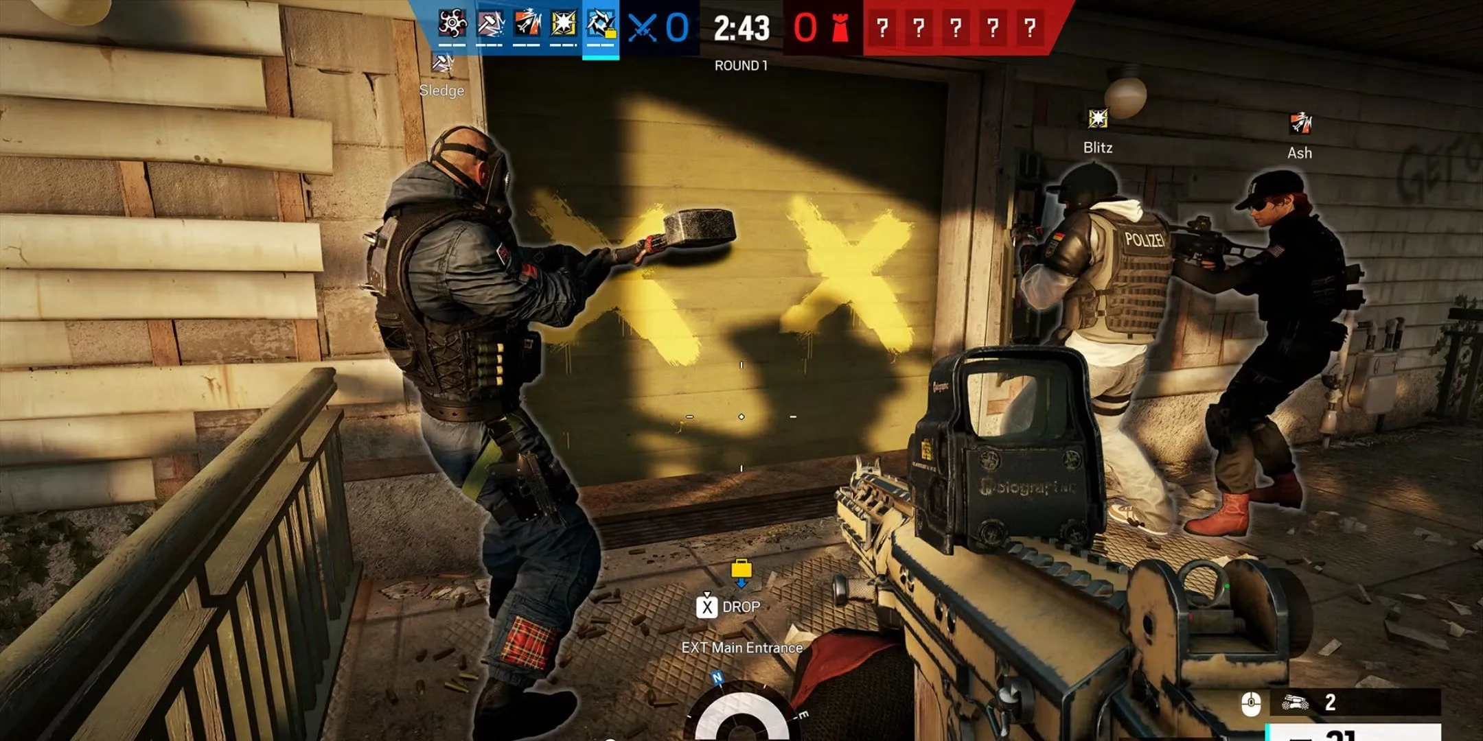 Đội đặc nhiệm Rainbow Six Siege chuẩn bị phá cửa xông vào