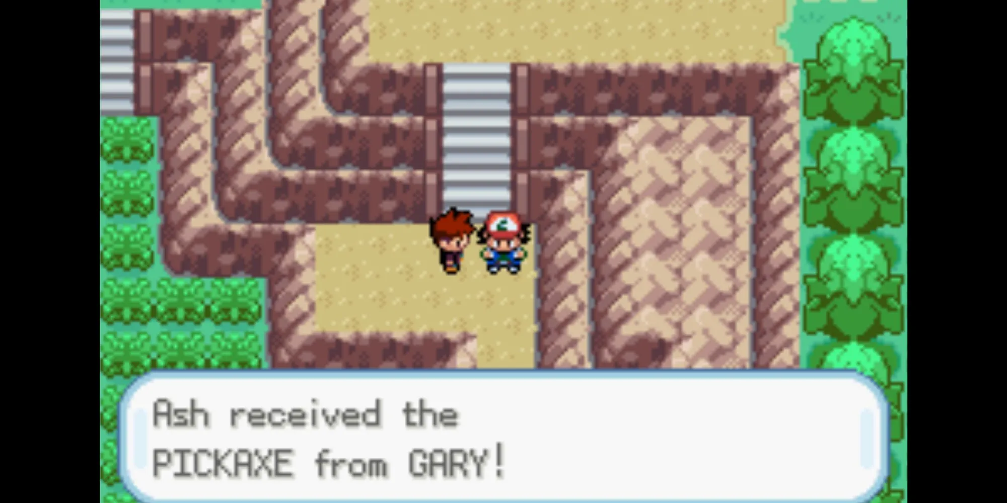 Gary đưa cho Ash chiếc cuốc chim cũ của mình để phá đá trong Pokémon Ash Gray