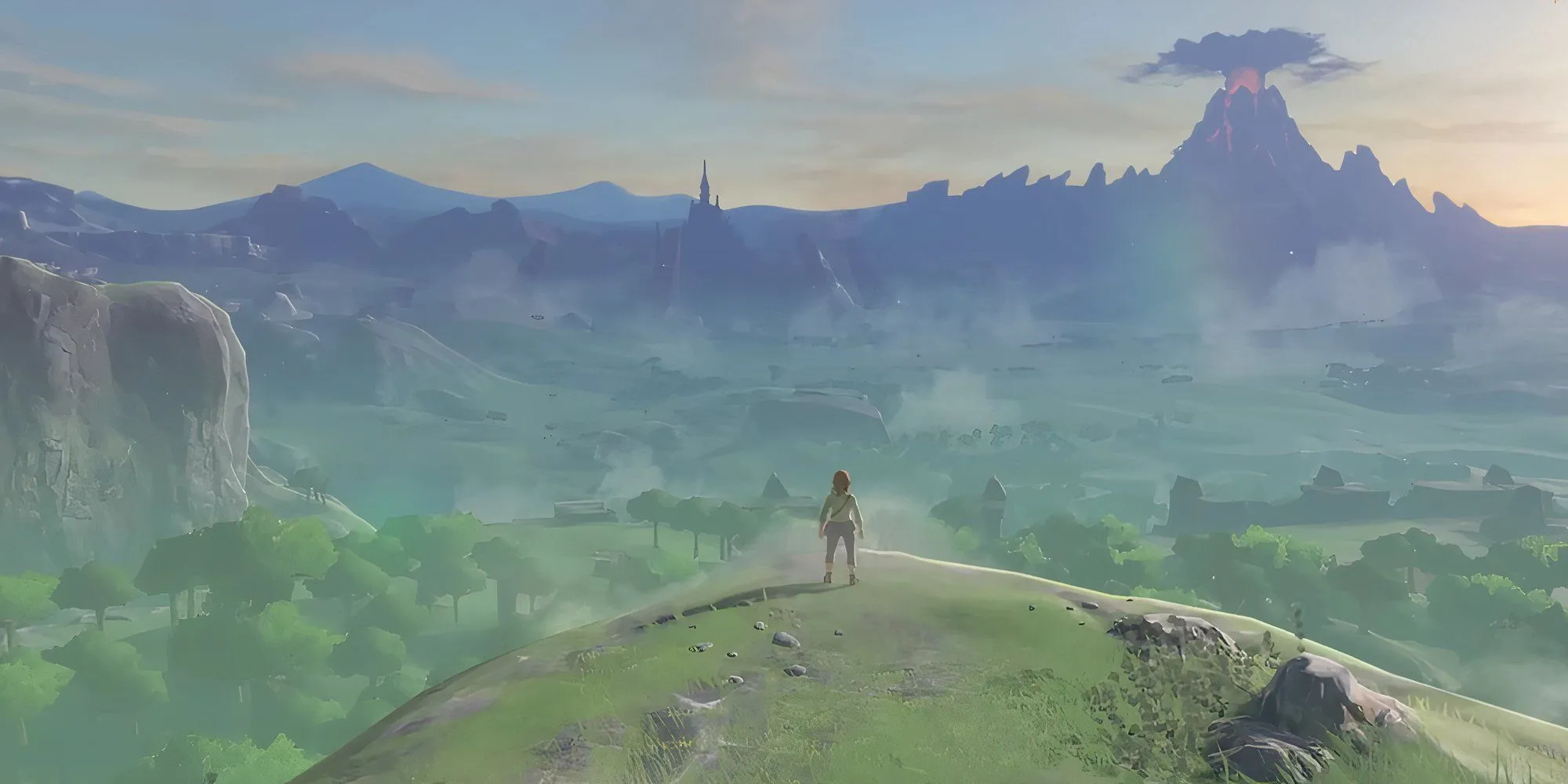Link trong The Legend of Zelda Breath Of The Wild đứng trên vách đá nhìn ra xa