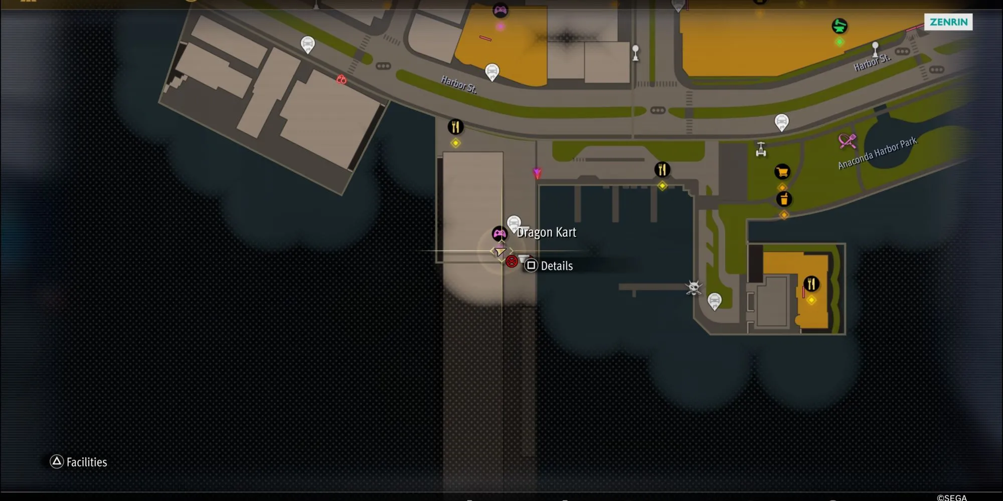 Majima đứng trước cổng vào khu vực Dragon Kart tại Anaconda Harbor Park trong Like A Dragon: Pirate Yakuza In Hawaii