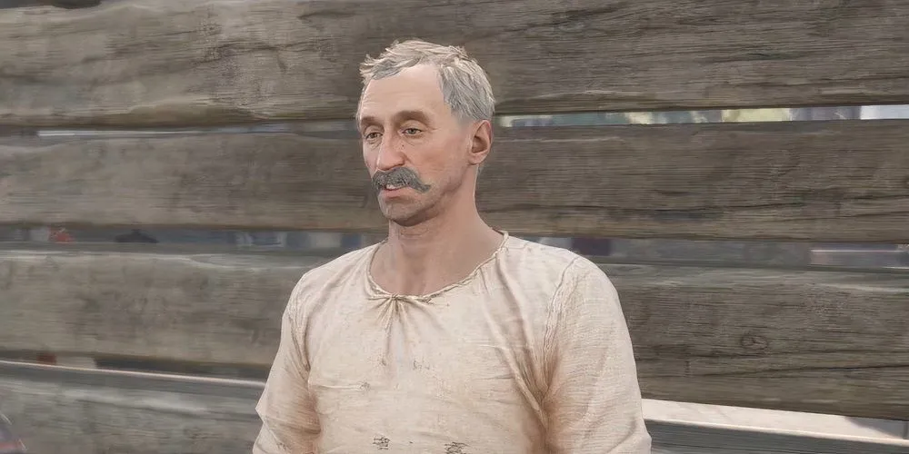 Mastek, người đánh xe, đang đứng đợi bên ngoài quán rượu ở Grund trong nhiệm vụ A Good Scrub của Kingdom Come Deliverance 2.