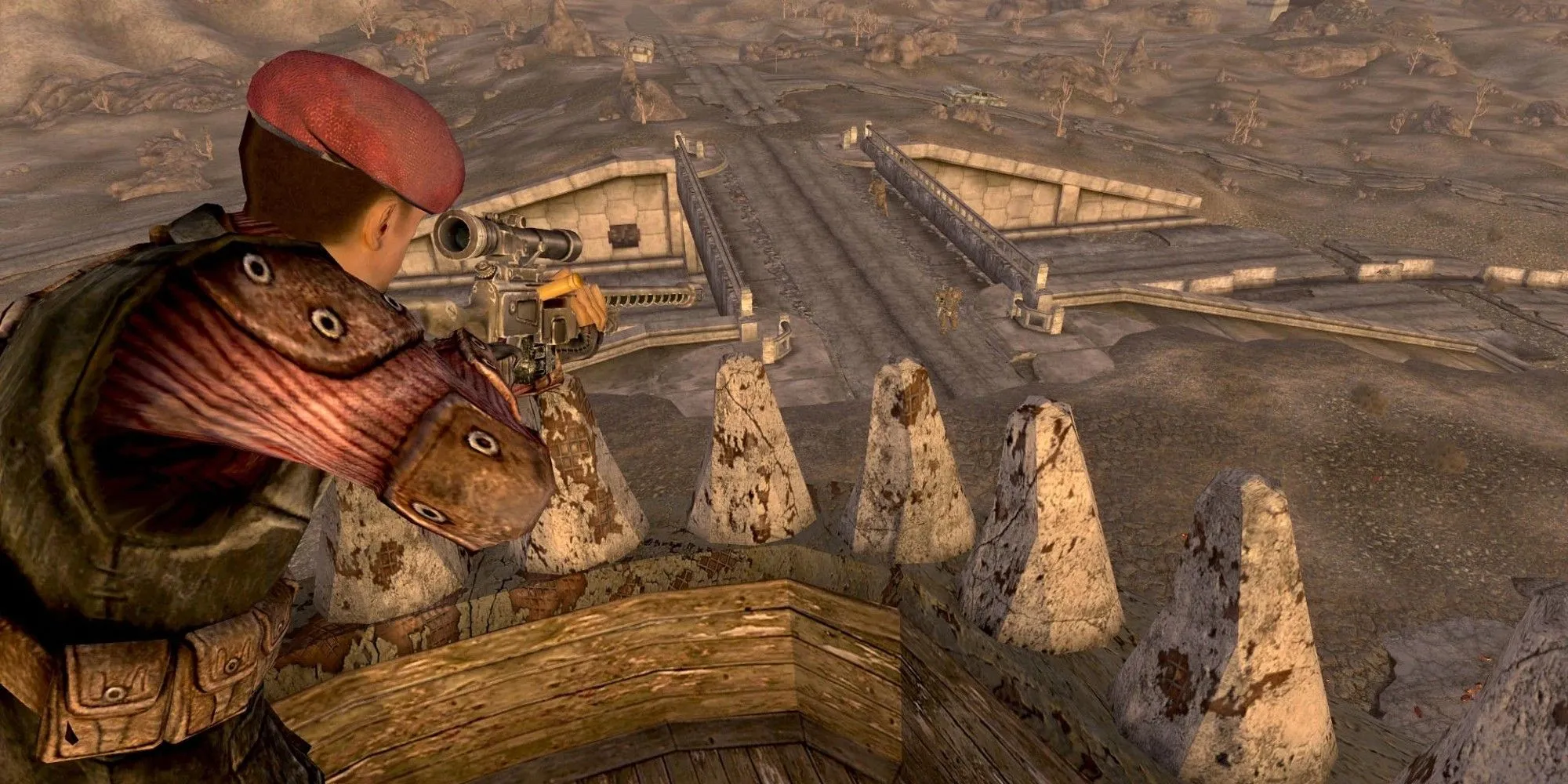 Một tay súng bắn tỉa quan sát vùng đất hoang trong Fallout New Vegas