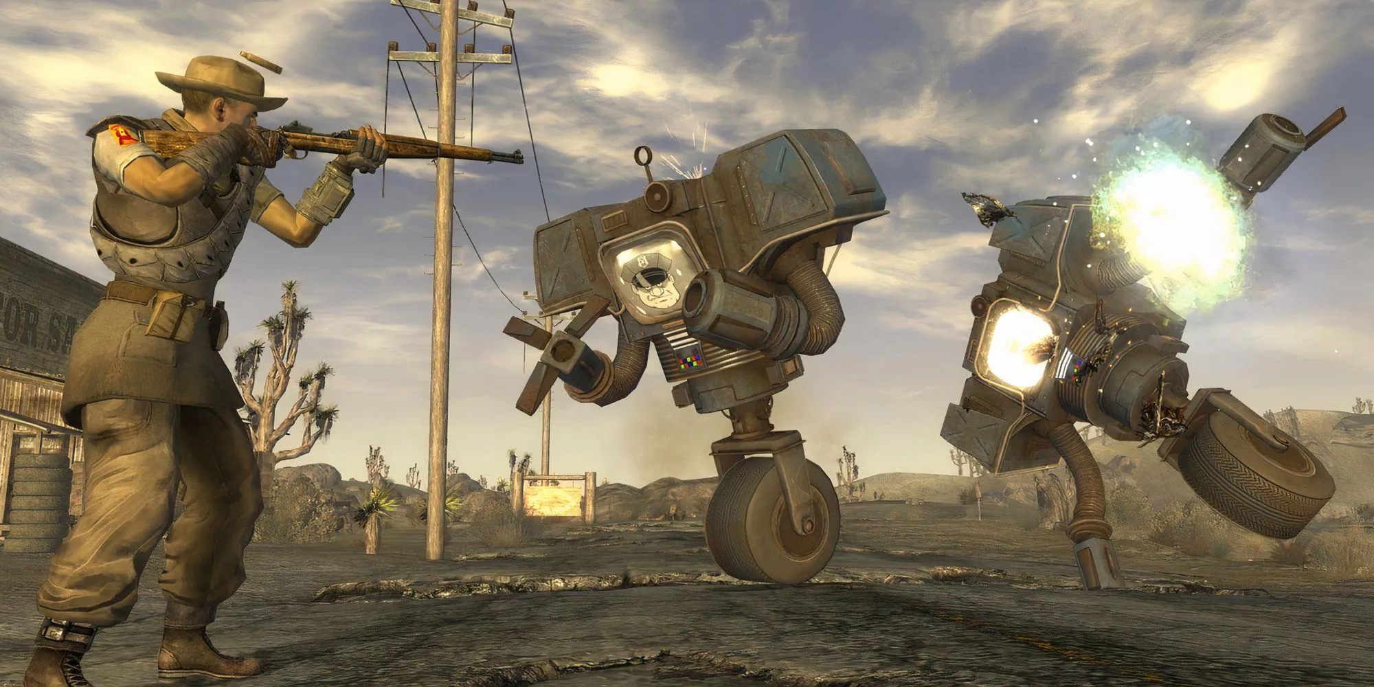 nhân vật chính Fallout New Vegas đang chiến đấu bằng shotgun giữa đám đông kẻ thù trong một khu vực hoang tàn