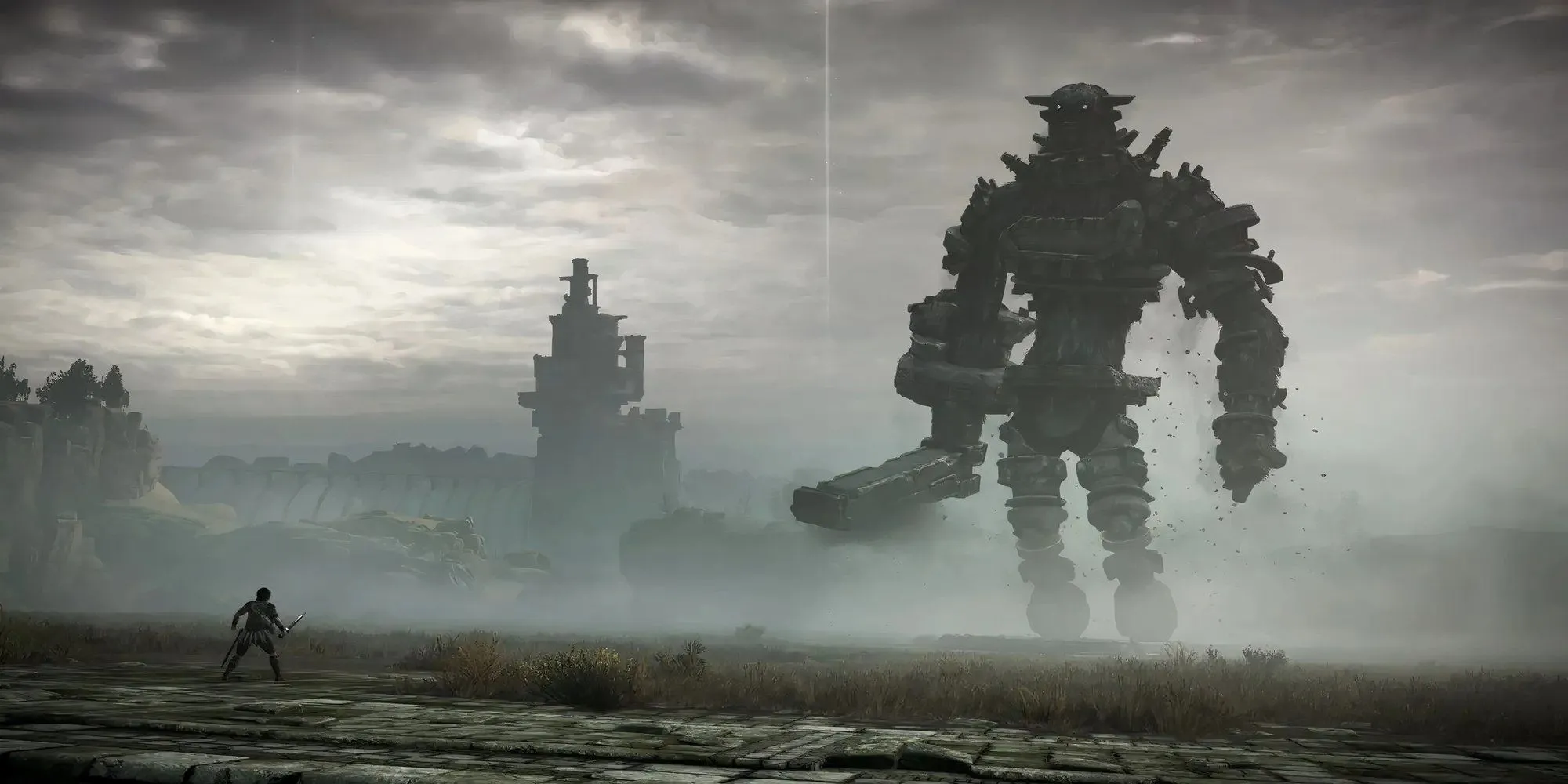 nhân vật chính Wander đối mặt với một Colossus khổng lồ trong Shadow of the Colossus