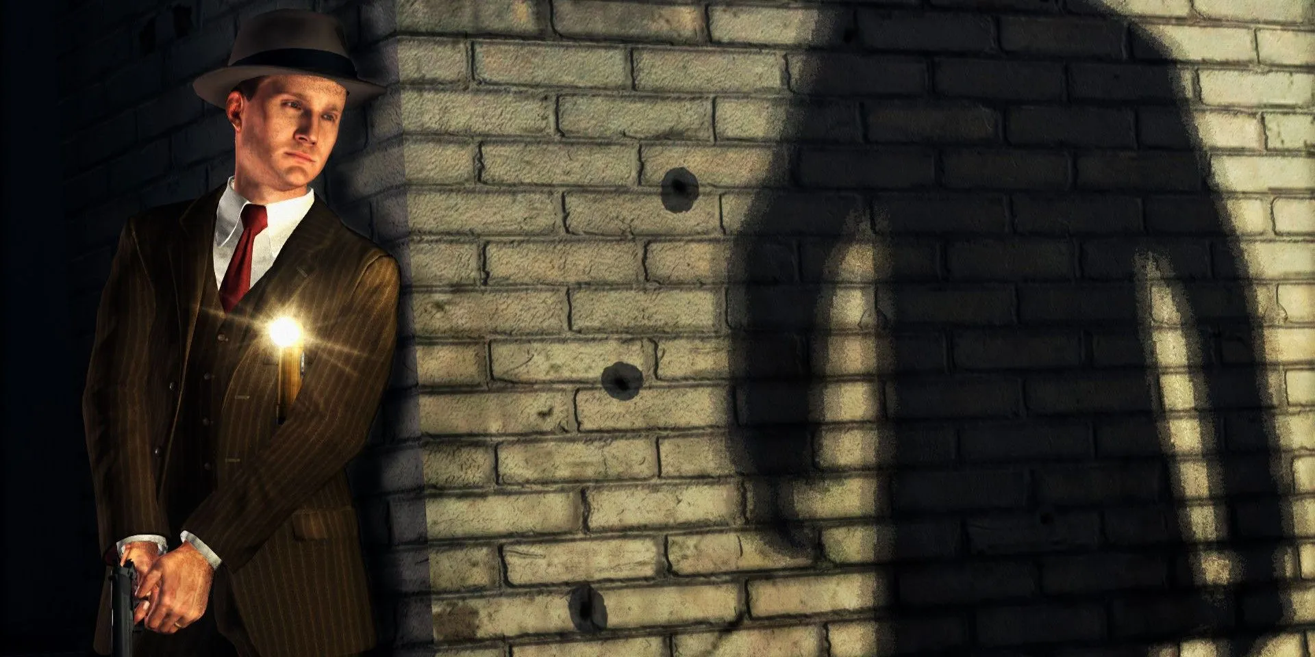 Thám tử Cole Phelps trong game L.A. Noire đang điều tra hiện trường vụ án tại Los Angeles những năm 1940