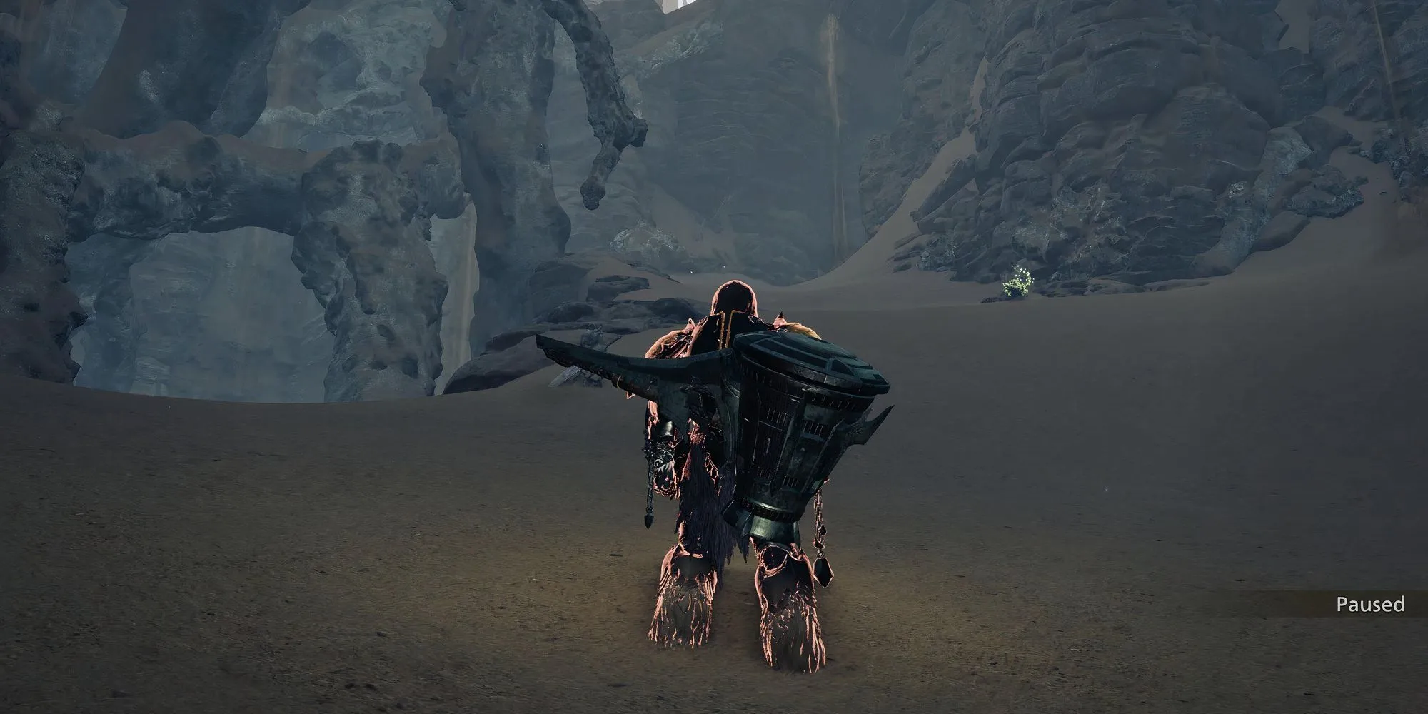 Thợ săn tìm kiếm Đồng Xu Wyvern Cổ Đại trong hang động Monster Hunter Wilds