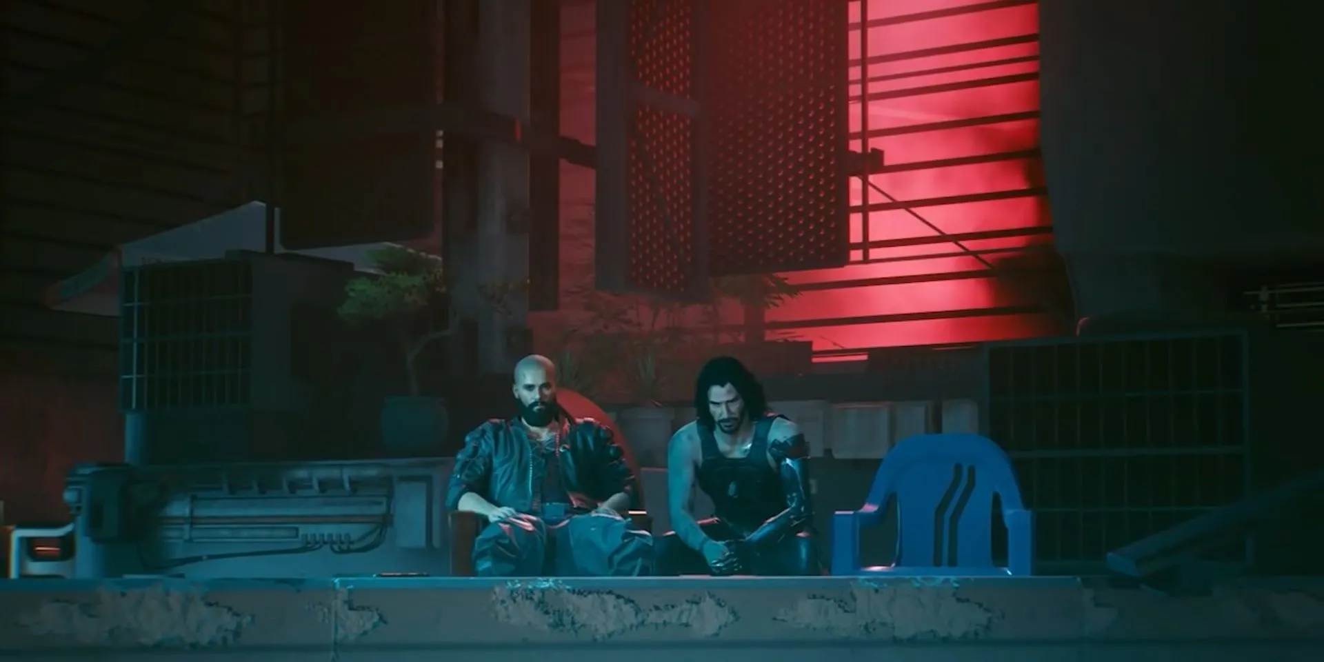 V và Johnny Silverhand trên sân thượng ở Night City trong Cyberpunk 2077, đứng trước một lựa chọn định mệnh có thể dẫn đến kết cục bi thảm.