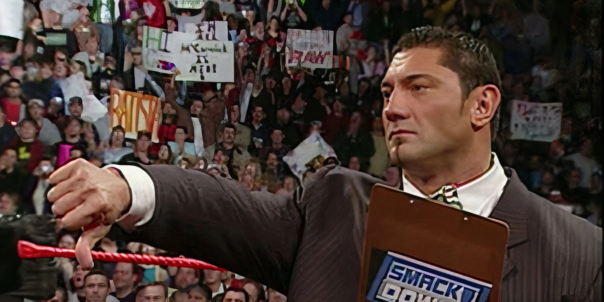 Batista đưa ngón cái xuống, quay lưng lại Triple H và Evolution trên WWE Raw 21/2/2005, dẫn đến trận đấu tại WrestleMania 21.