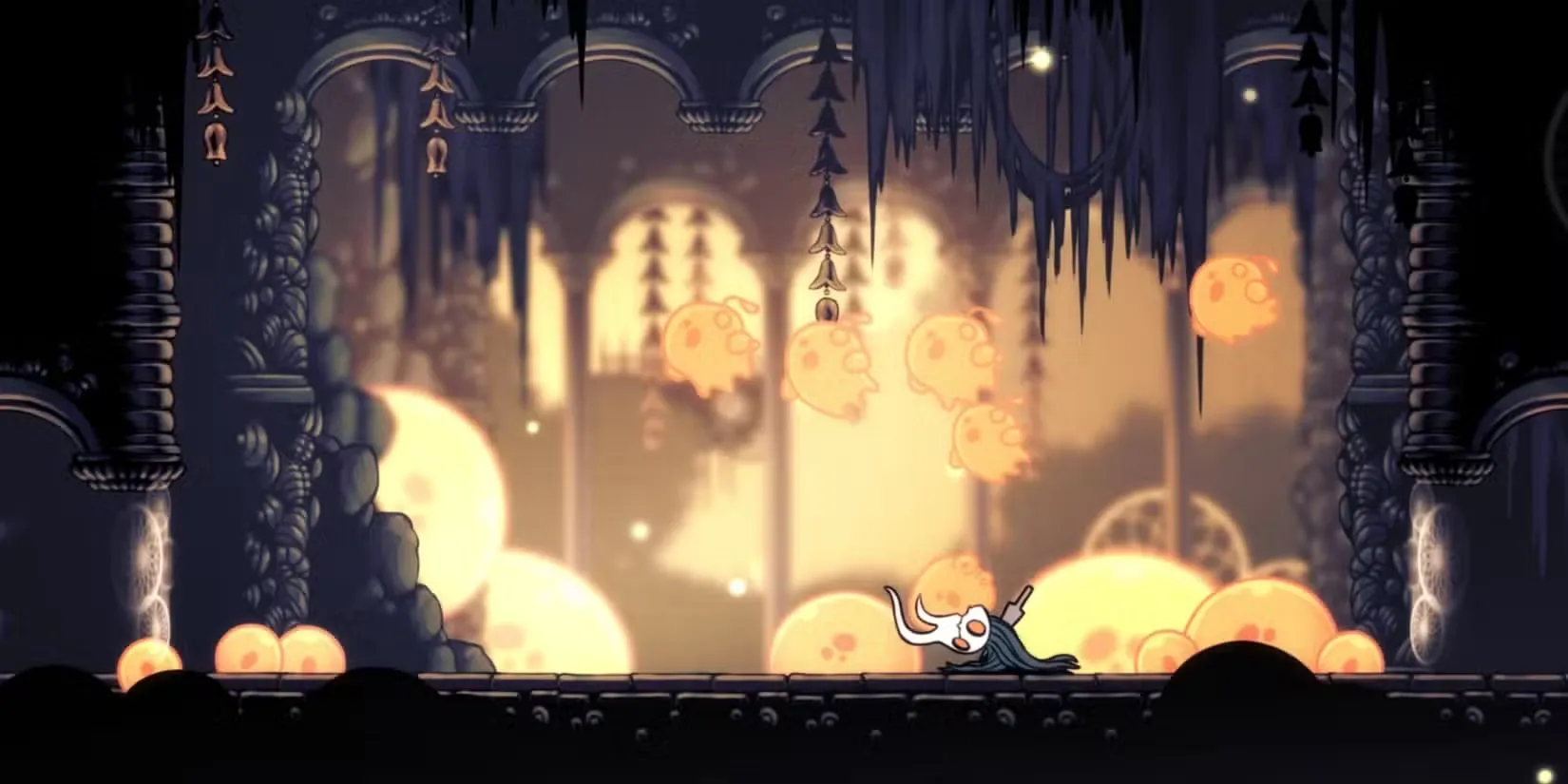 Cảnh chiến đấu với boss Lost Kin trong Hollow Knight