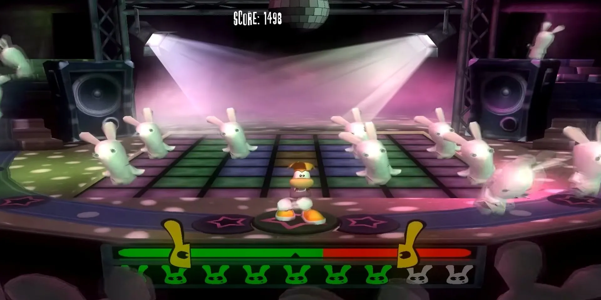 Cảnh một minigame nhảy múa đầy màu sắc và hỗn loạn trong game Rayman Raving Rabbids