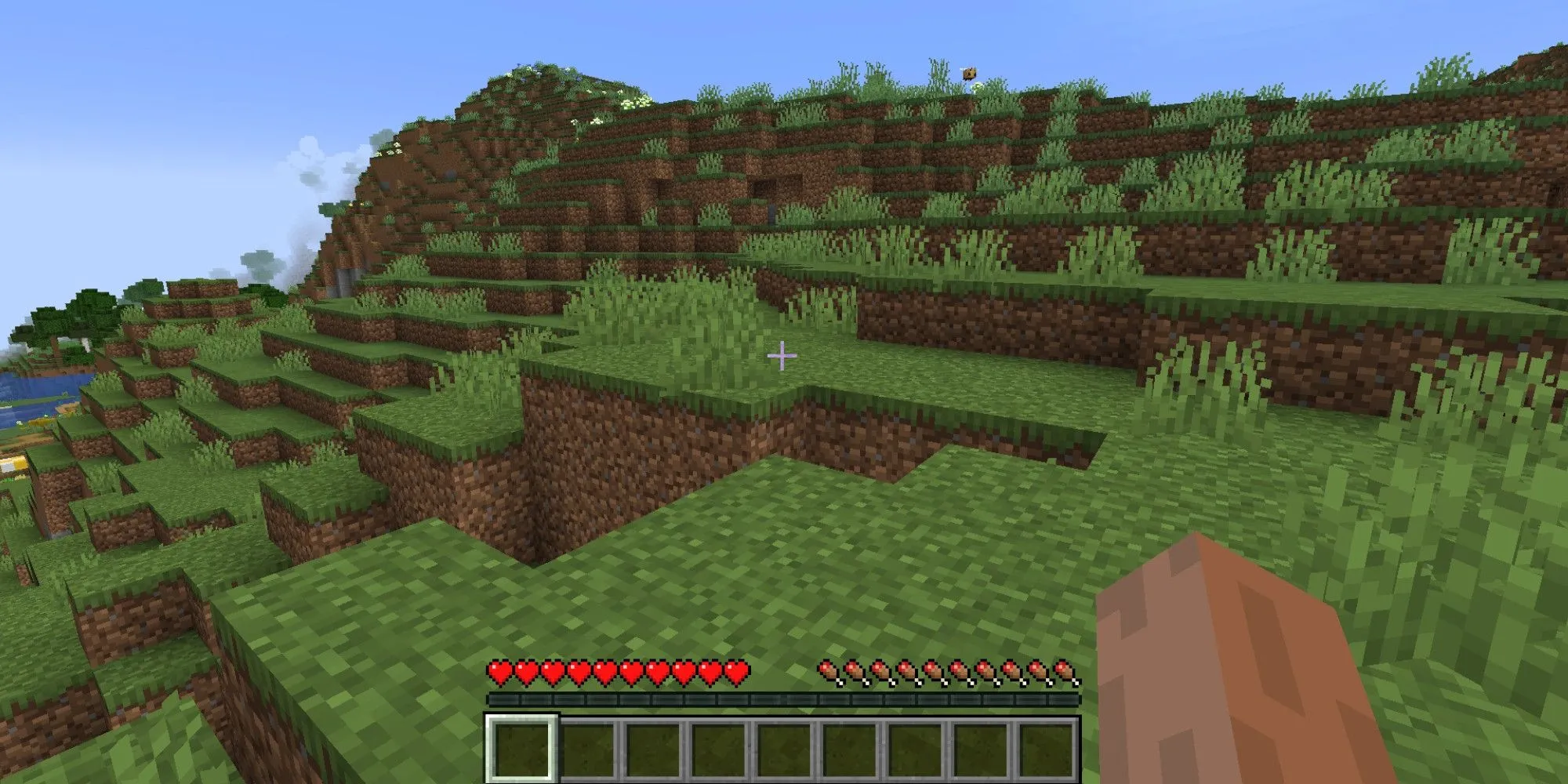 Cảnh người chơi sinh tồn trong thế giới của Minecraft, tựa game bán chạy nhất lịch sử nhưng không thiếu lỗi &quot;duyên dáng&quot;.