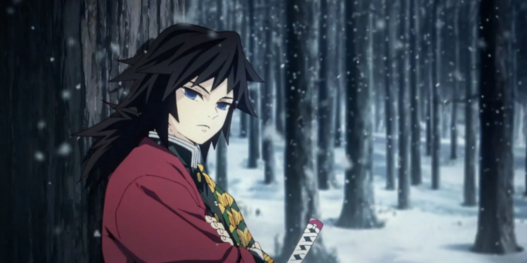 Giyuu Tomioka trong rừng tuyết sử dụng Hơi Thở Của Nước trong Demon Slayer