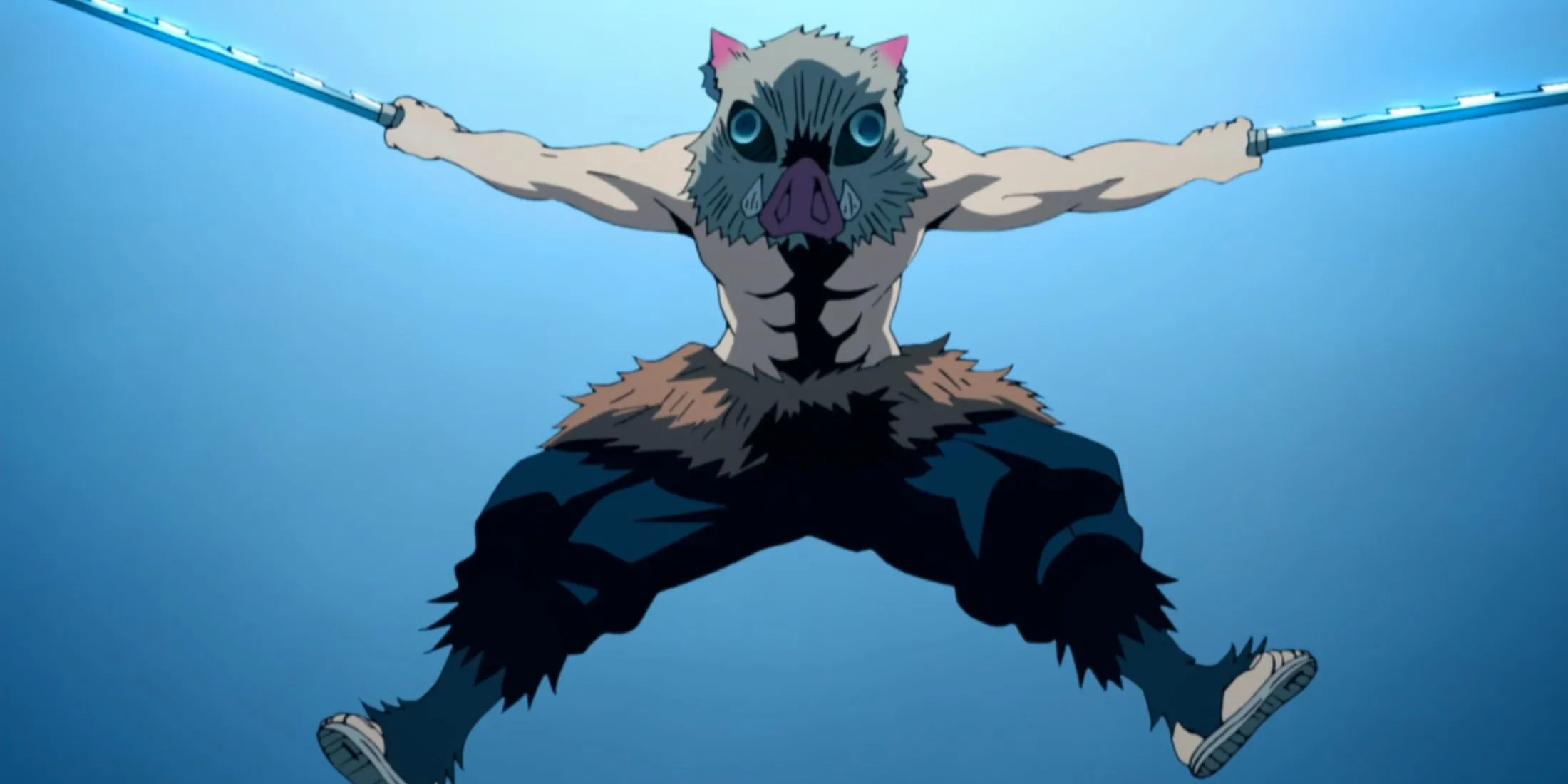 Inosuke Hashibira tỉnh dậy và lao ra từ trần tàu trong Arc Chuyến Tàu Vô Tận của Demon Slayer