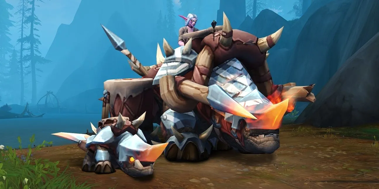 Một con thú cưỡi Kodo Crushhoof khổng lồ màu xanh dương với nhân vật đang cưỡi trên lưng, trong thế giới của World of Warcraft