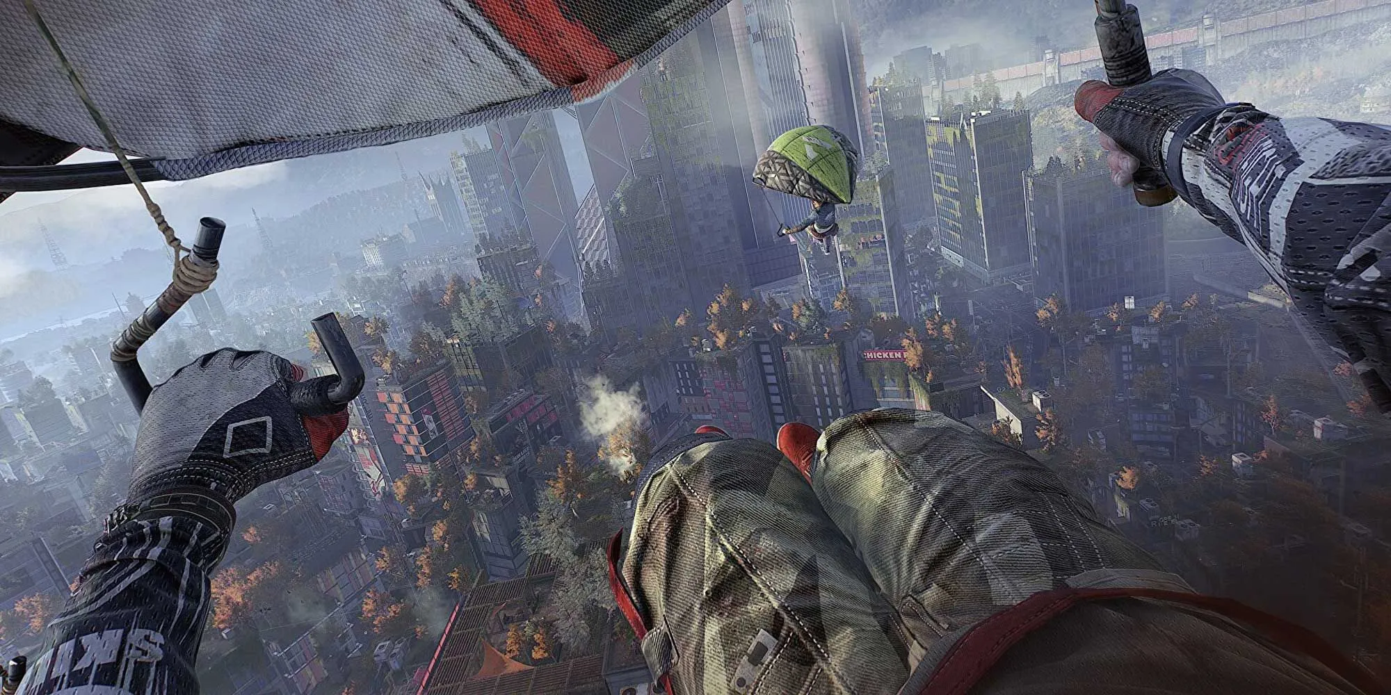 Người chơi sử dụng dù lượn để di chuyển trên không trung ở Villedor trong Dying Light 2, tận dụng tối đa không gian ba chiều.
