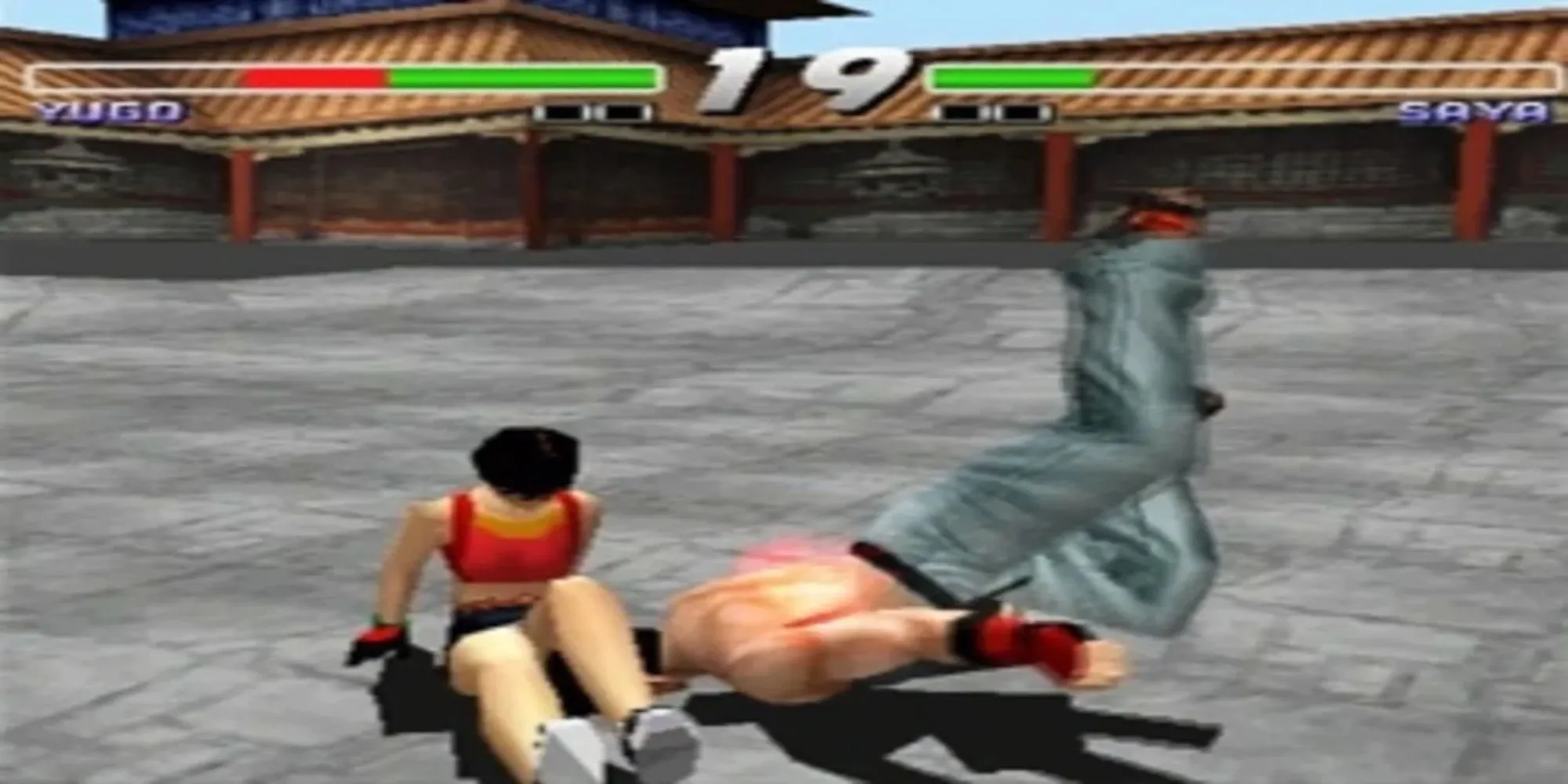 Nhân vật đang thực hiện chiêu thức trong game đối kháng Kensei: Sacred Fist trên PlayStation 1