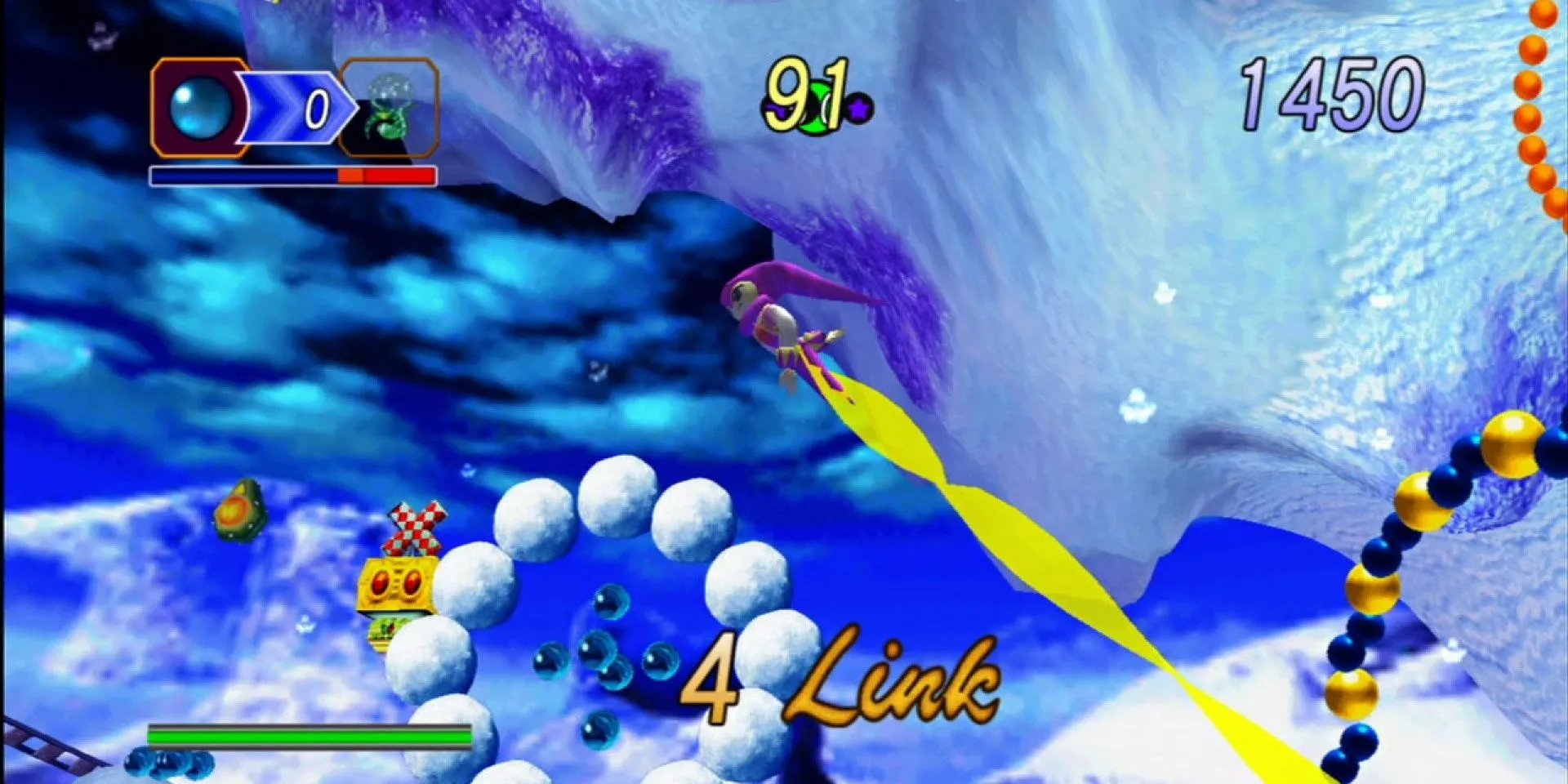 Nhân vật Nights bay qua các vòng ring trong game Nights into Dreams trên SEGA Saturn