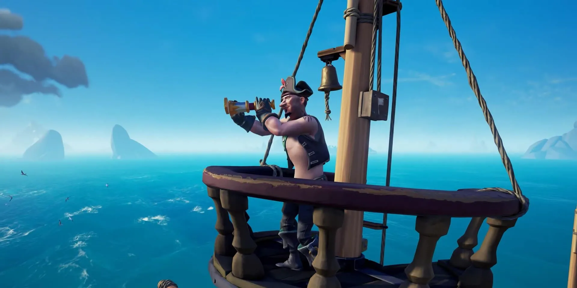 Tàu cướp biển neo đậu tại một hòn đảo trong Sea of Thieves