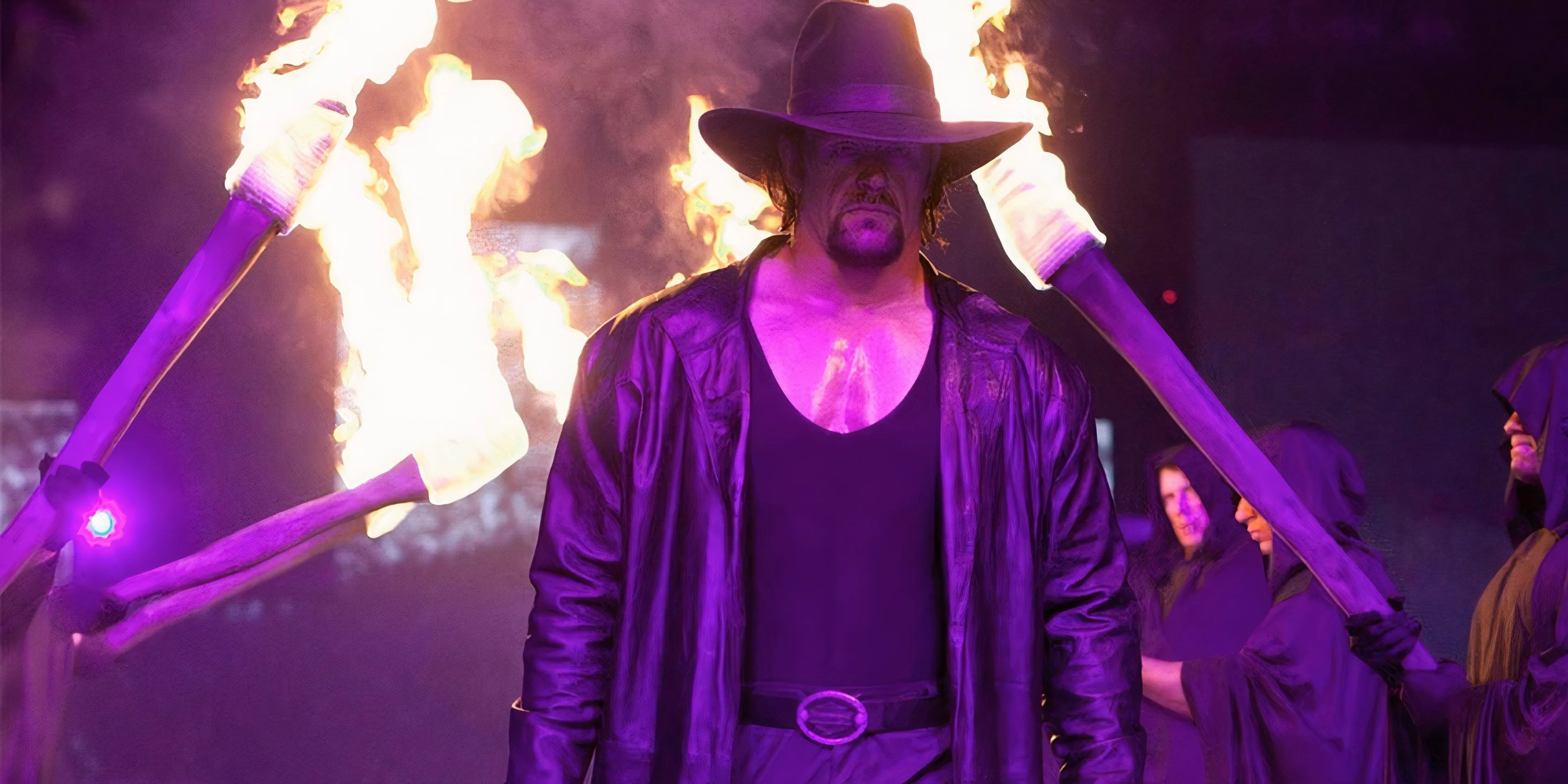 The Undertaker bước ra sân khấu WrestleMania 20 cùng Paul Bearer và đoàn tùy tùng cầm đuốc