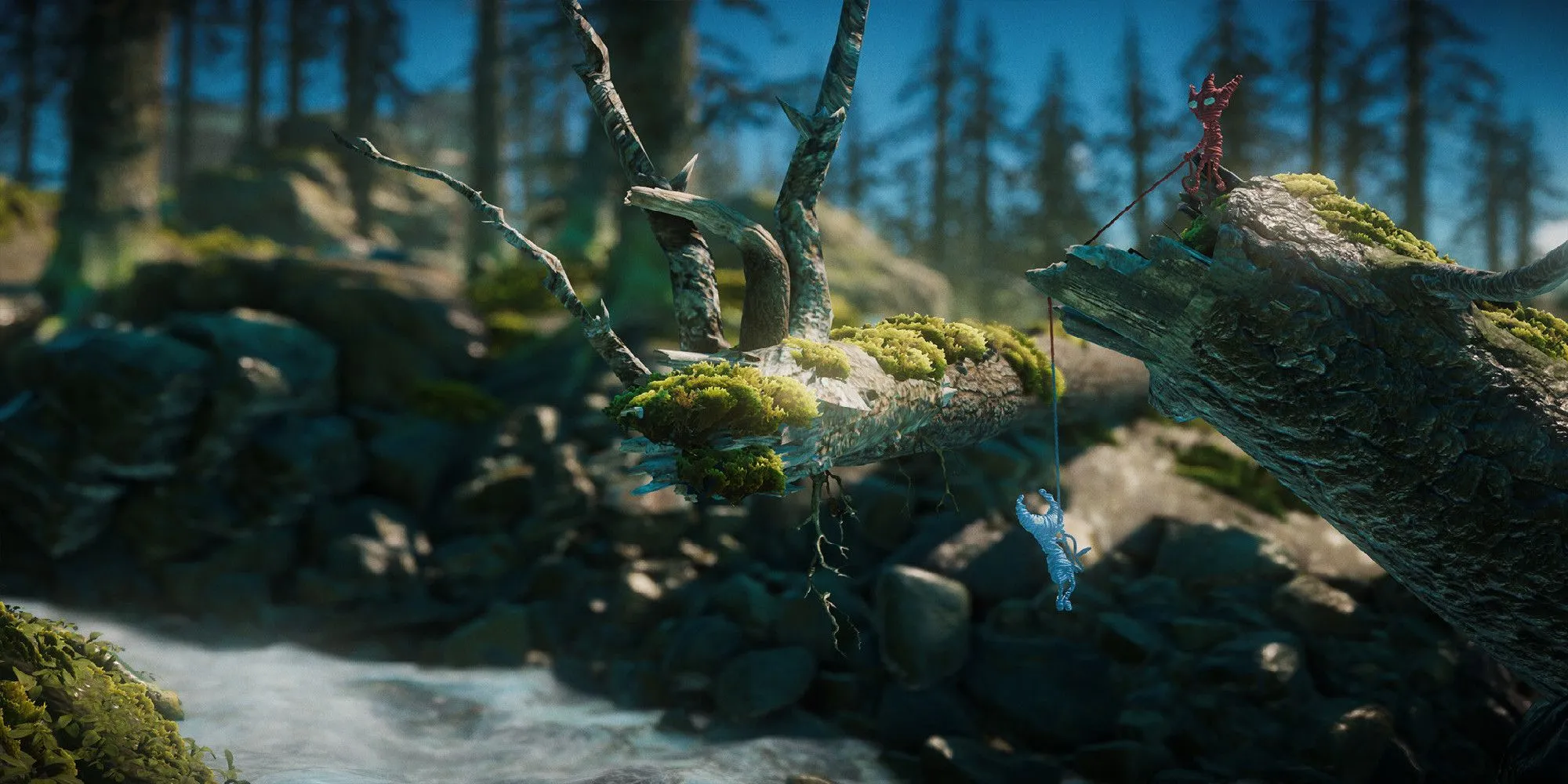 Unravel 2 player pulling up another player by their string
