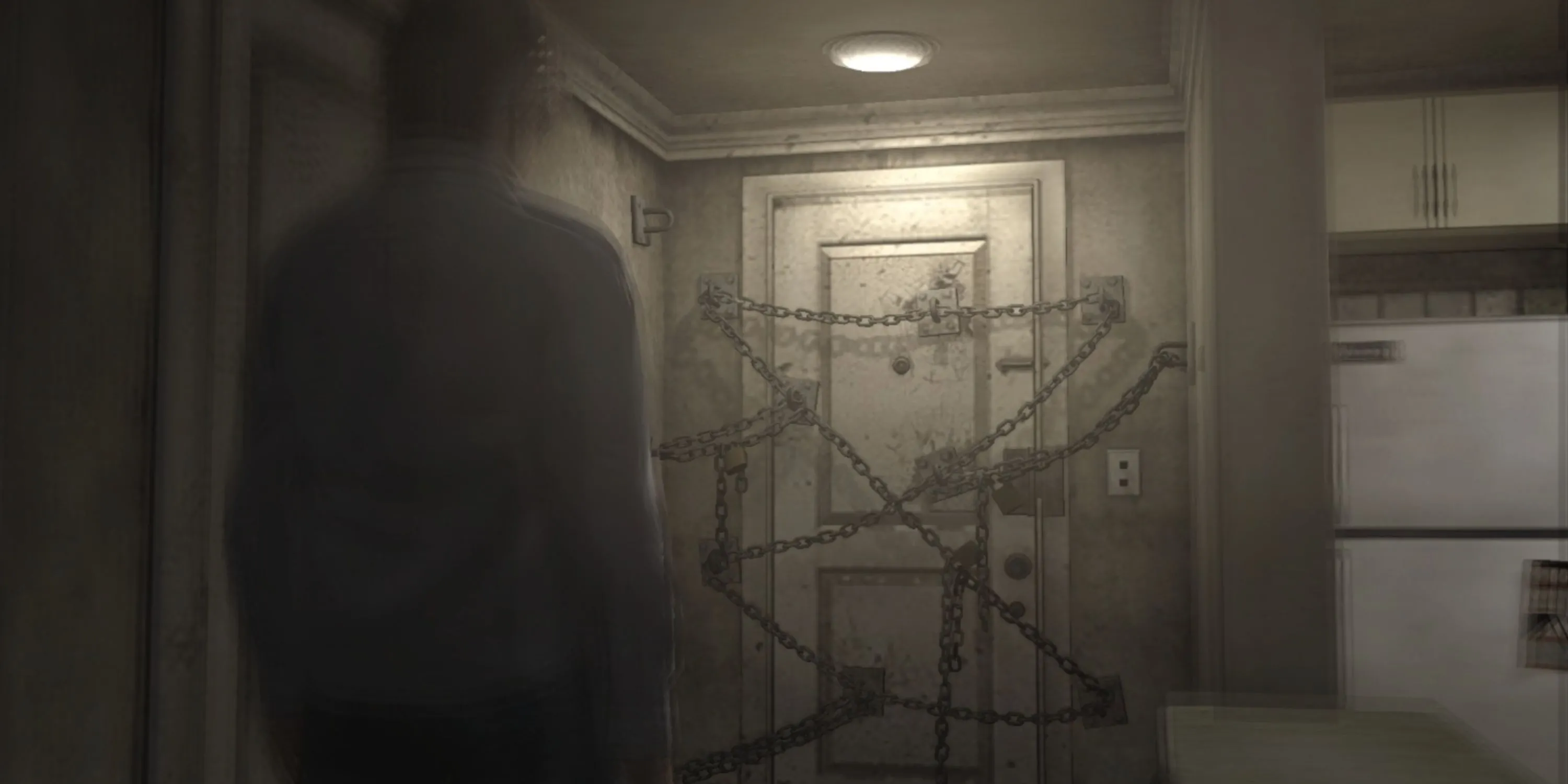 Bìa đĩa game kinh dị Silent Hill 4: The Room với nhân vật chính và hình ảnh ám ảnh.