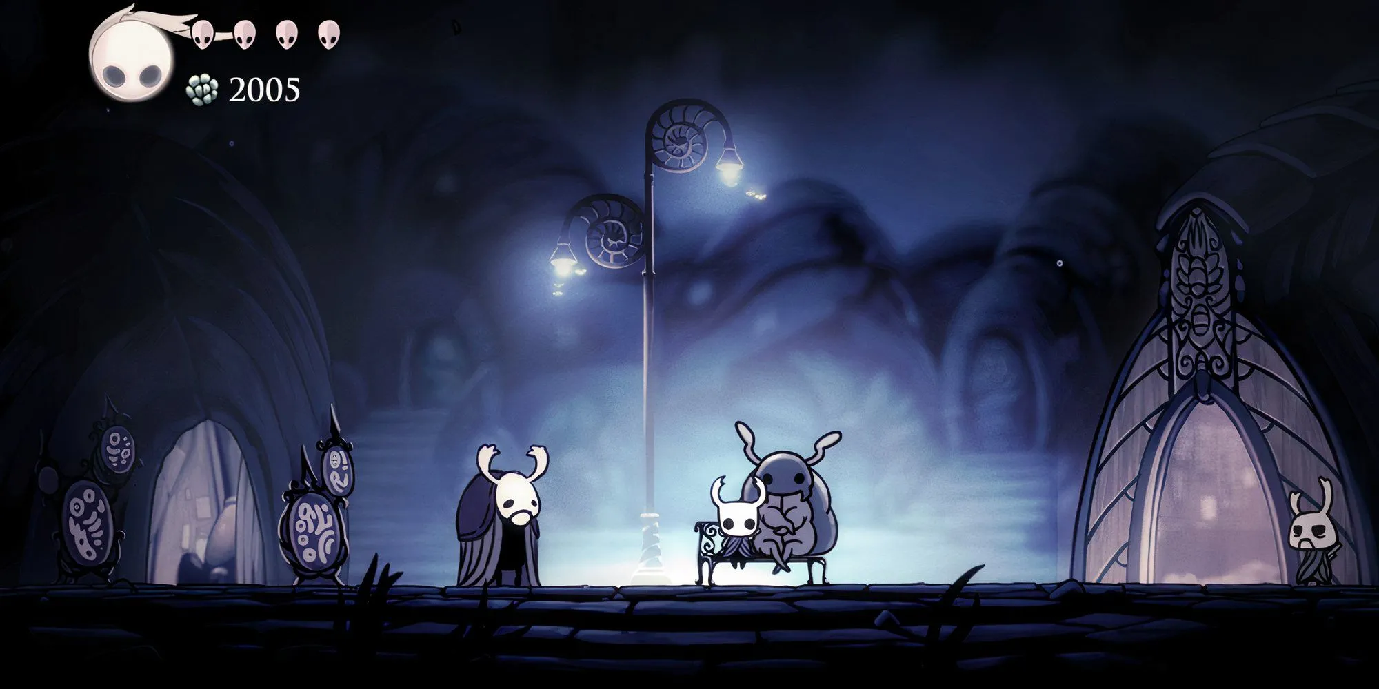 Kị Sĩ Rong (The Knight) ngồi nghỉ trên băng ghế cạnh một NPC tại Thành Phố Nước Mắt trong Hollow Knight